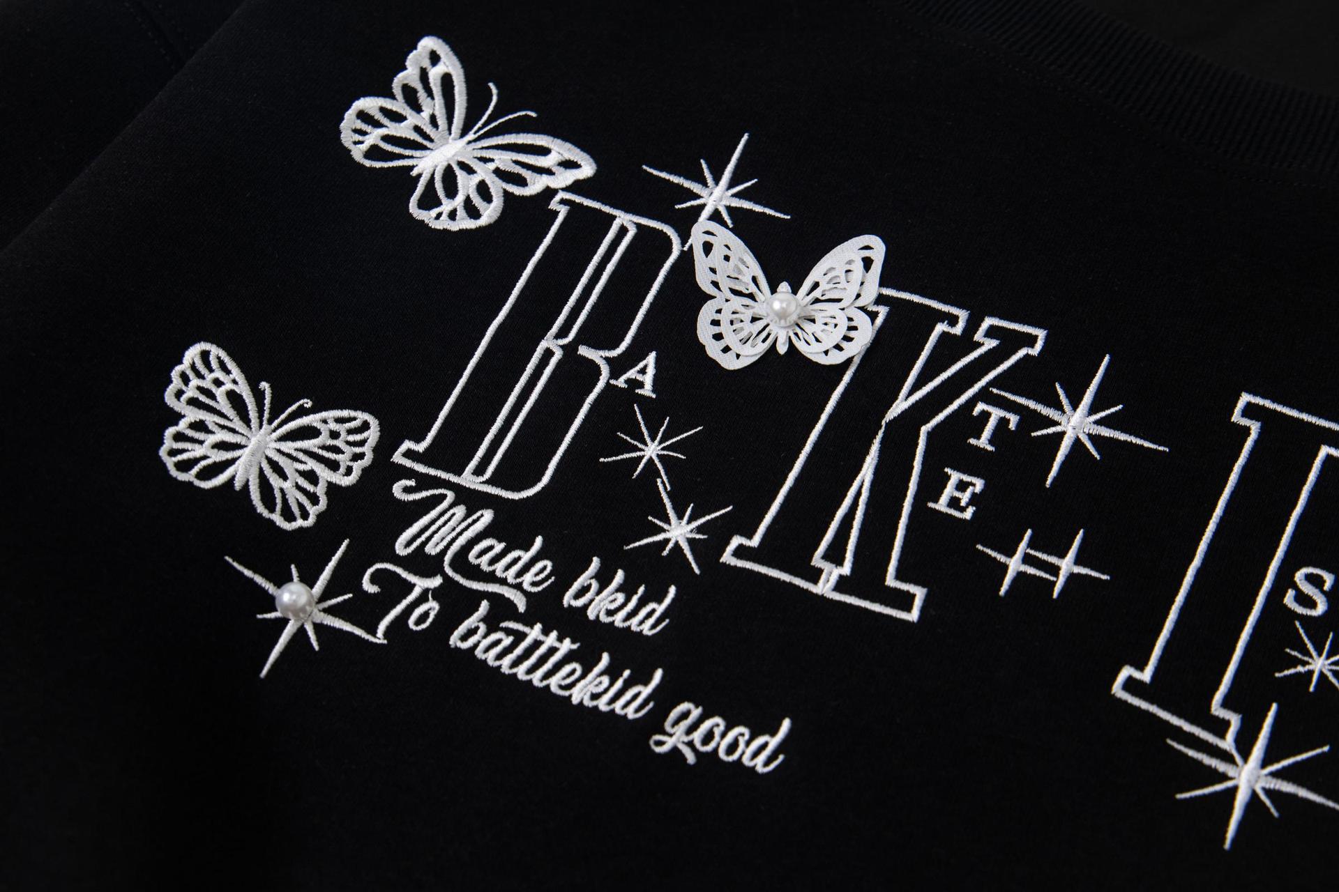 Dimensional Winged Flame Studded Hoodie