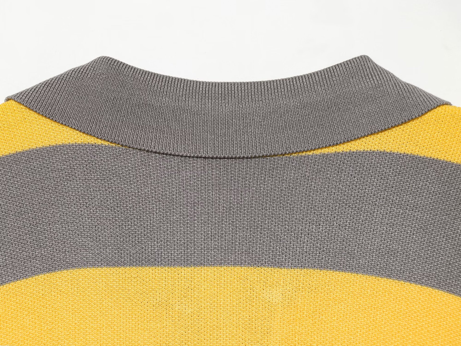 Striped knitted polo shirt