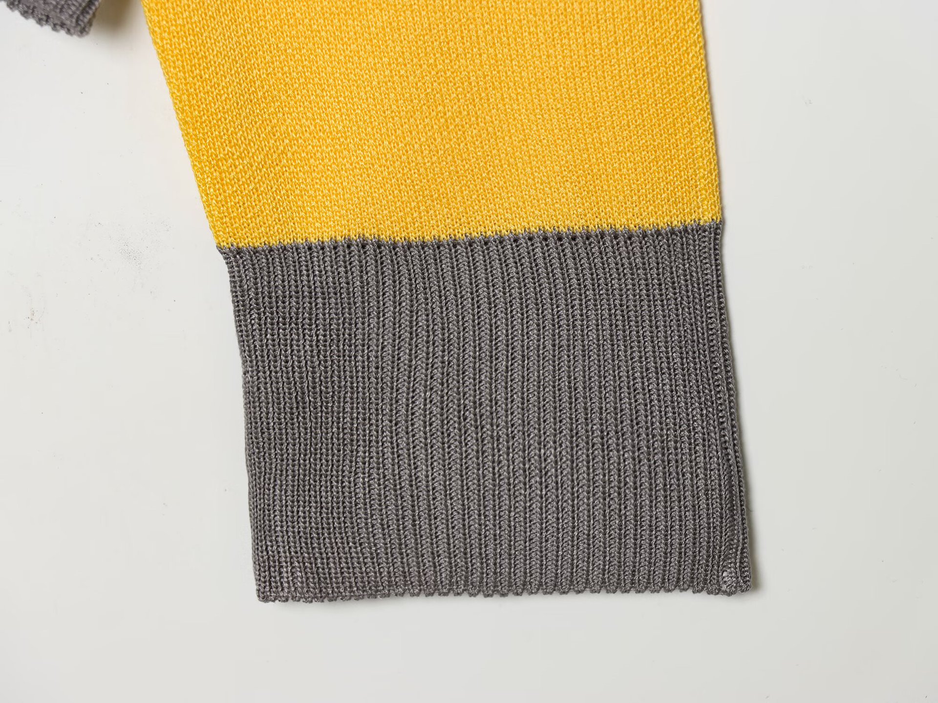 Striped knitted polo shirt