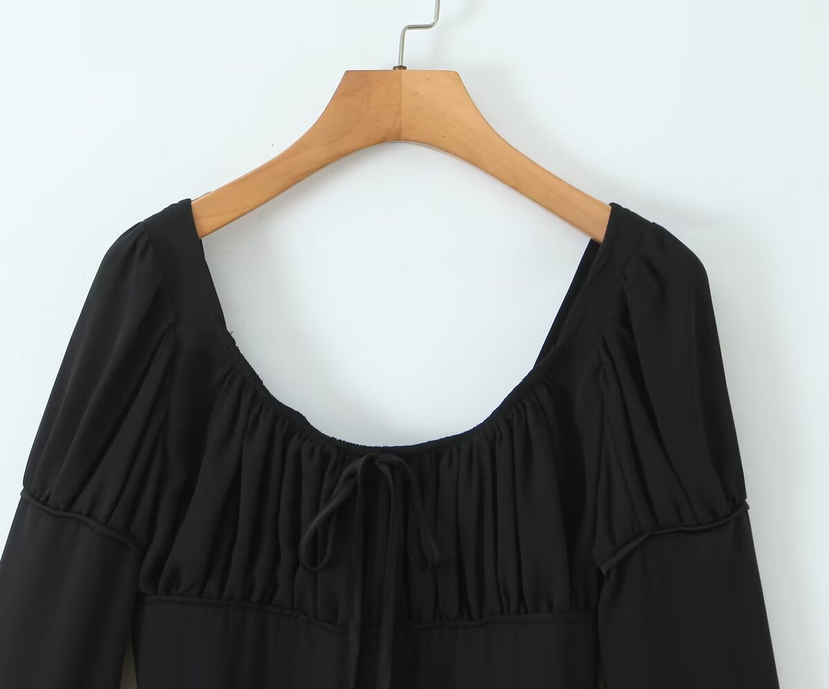 Square collar long sleeved backless black fungus trimmed short dress for women