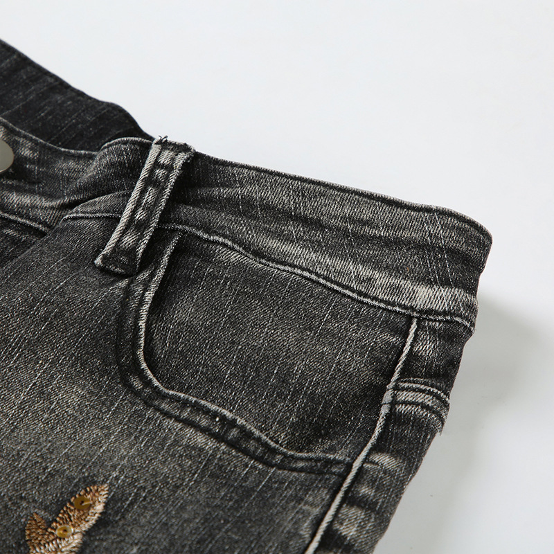 Bead embroidery floral design for vintage washed micro flared jeans