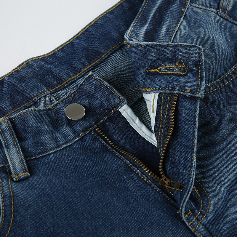 Vintage pleated washed denim jeans with loose fit and low waisted design for the street
