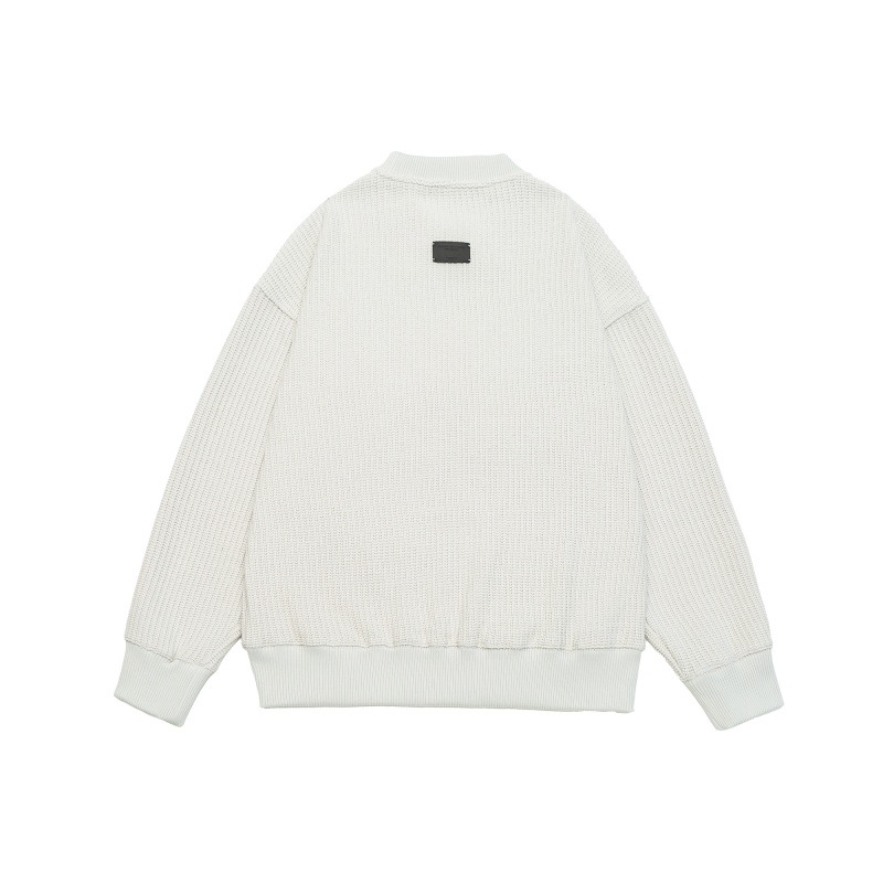 Solid color letter embossed round neck loose knit sweater