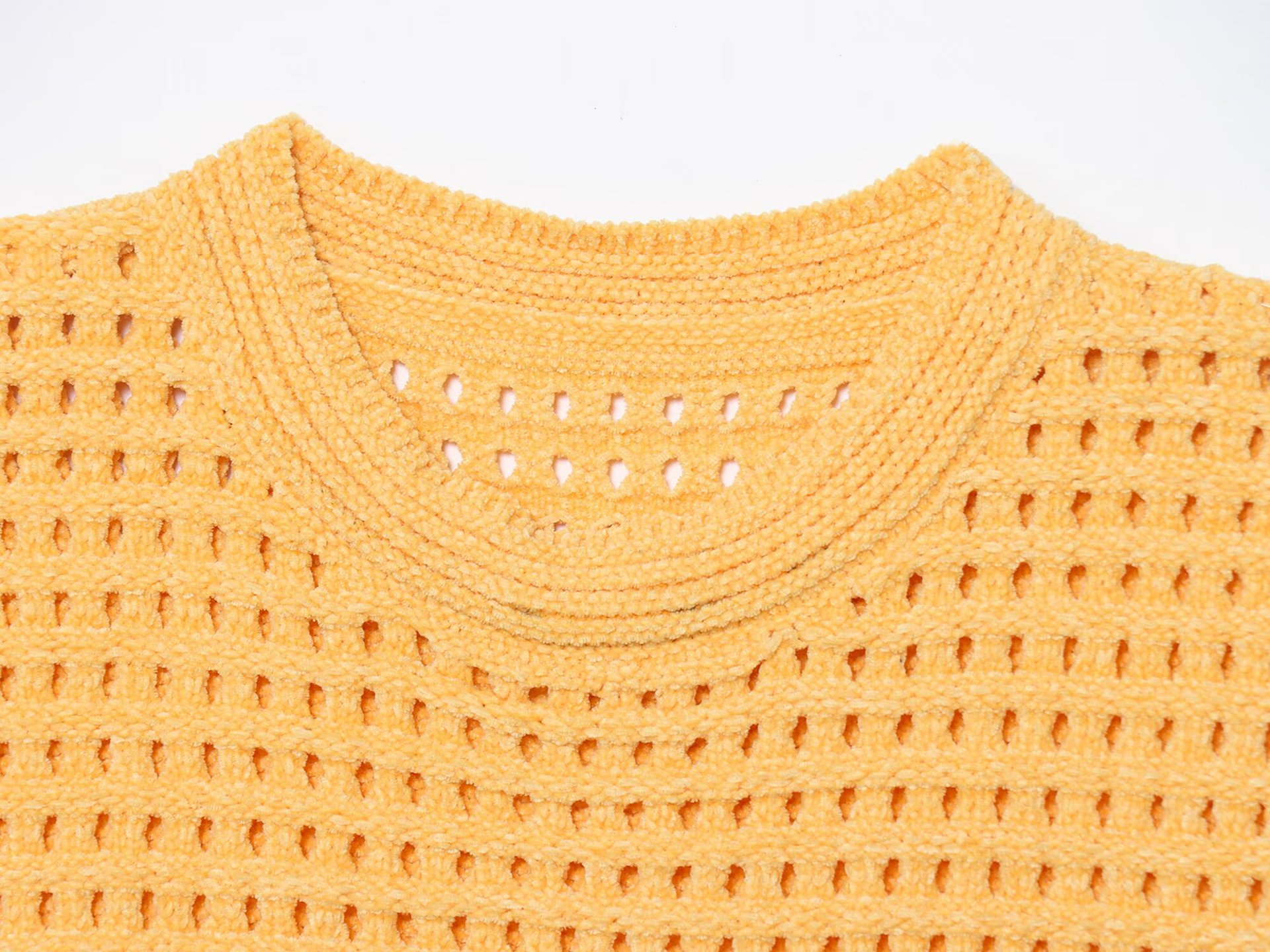 Round neck sleeveless tassel embellished hollow grid knit sweater for women
