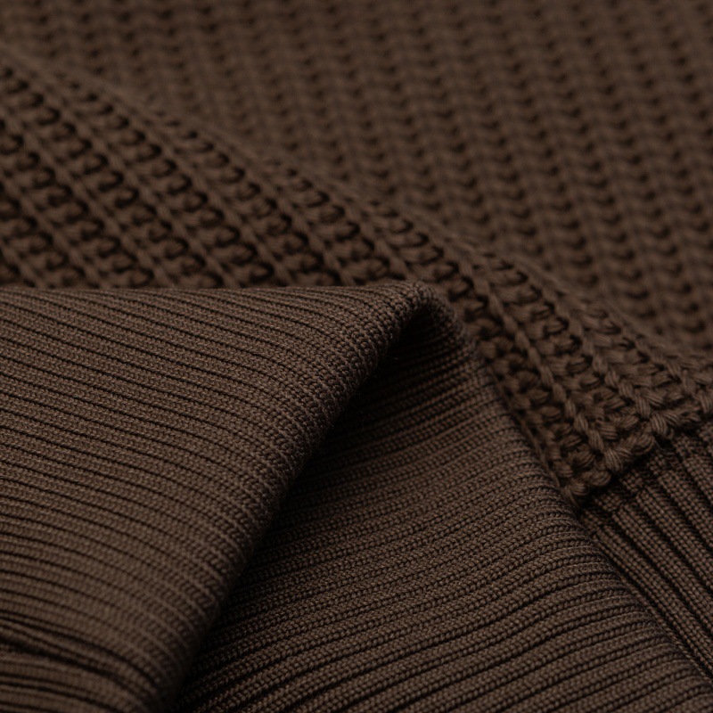 Solid color letter embossed round neck loose knit sweater