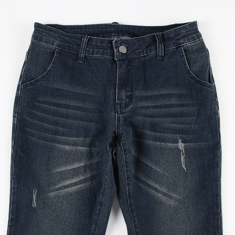 Retro hot girl washed and worn low waisted slightly flared jeans