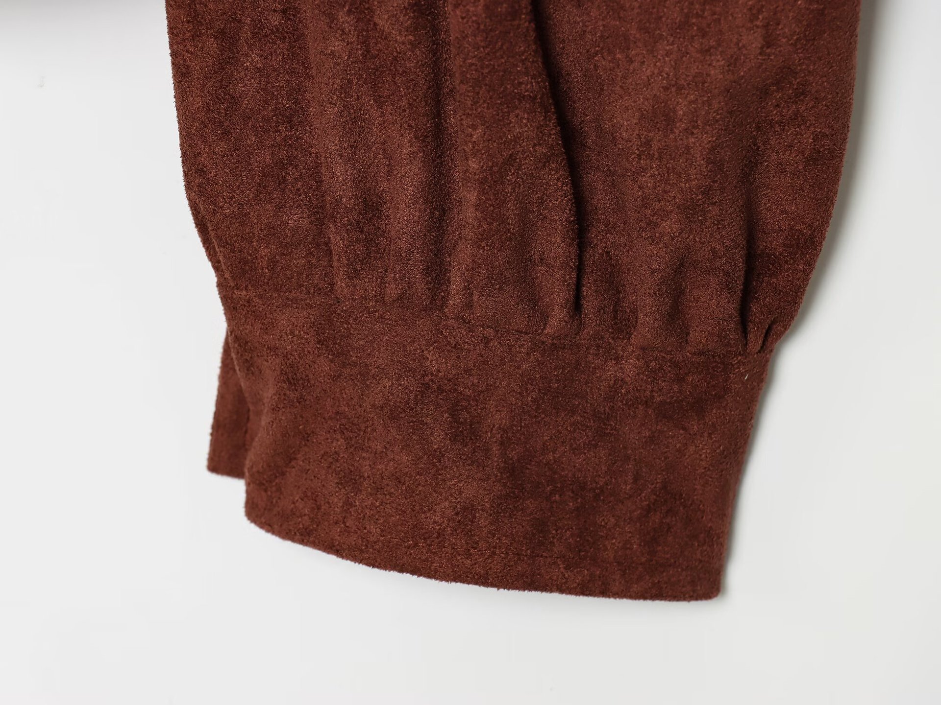 Suede textured pleated outerwear
