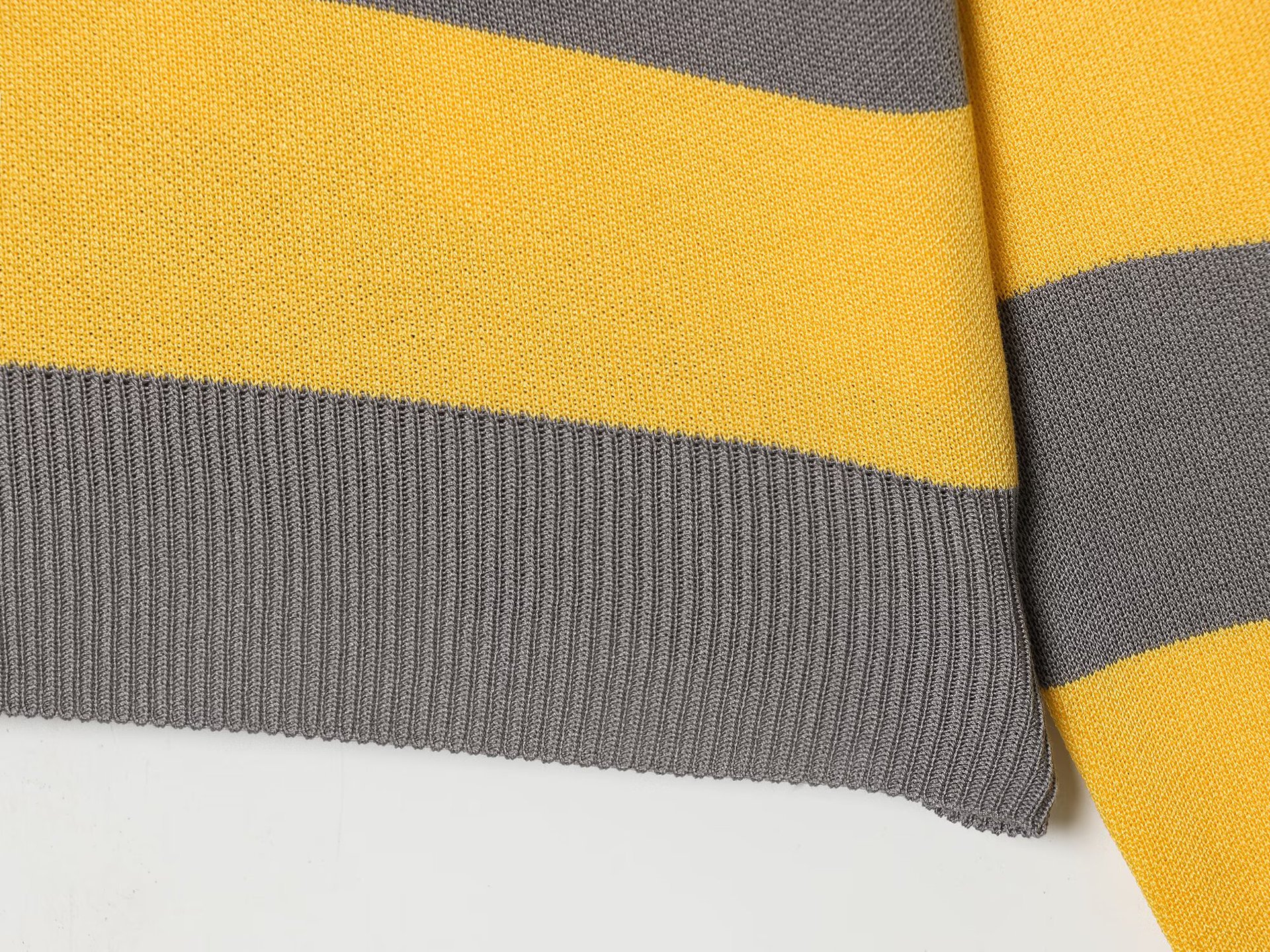 Striped knitted polo shirt