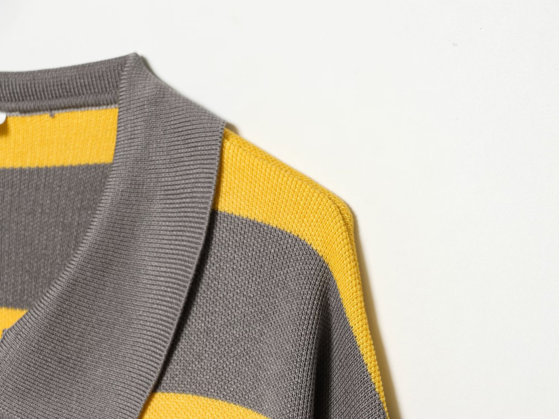 Striped knitted polo shirt