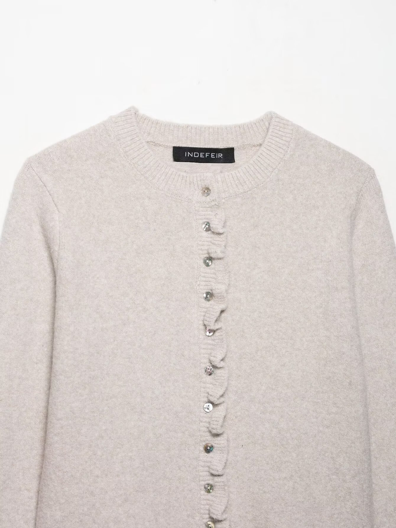 Stacked decorative knitted jacket