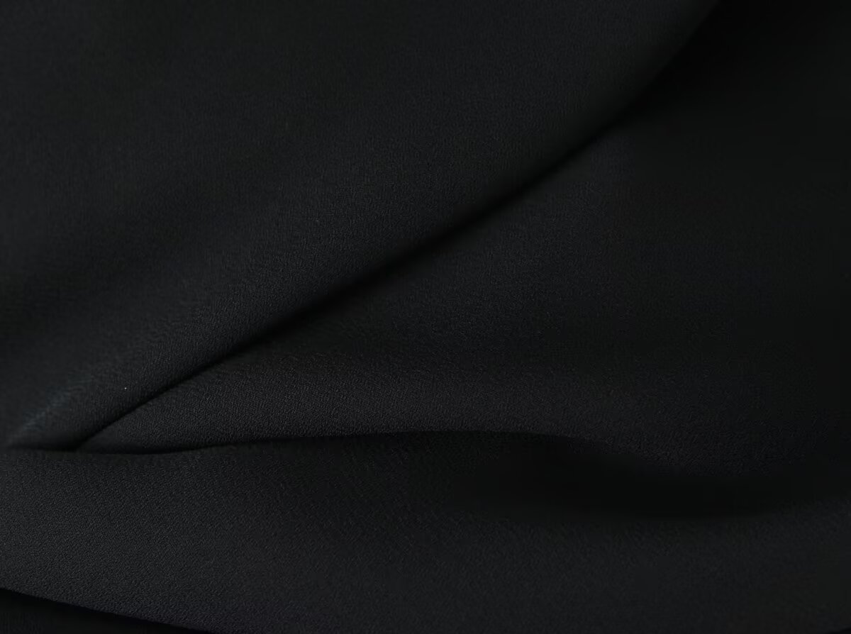 Square collar long sleeved backless black fungus trimmed short dress for women