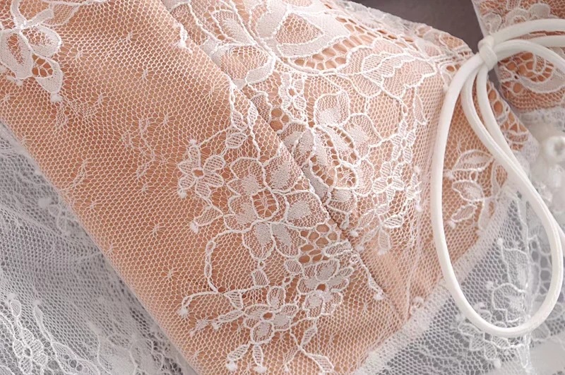 Contemporary Loose-Fit Plunge Rear Keyhole Wrist-Length Puff Top