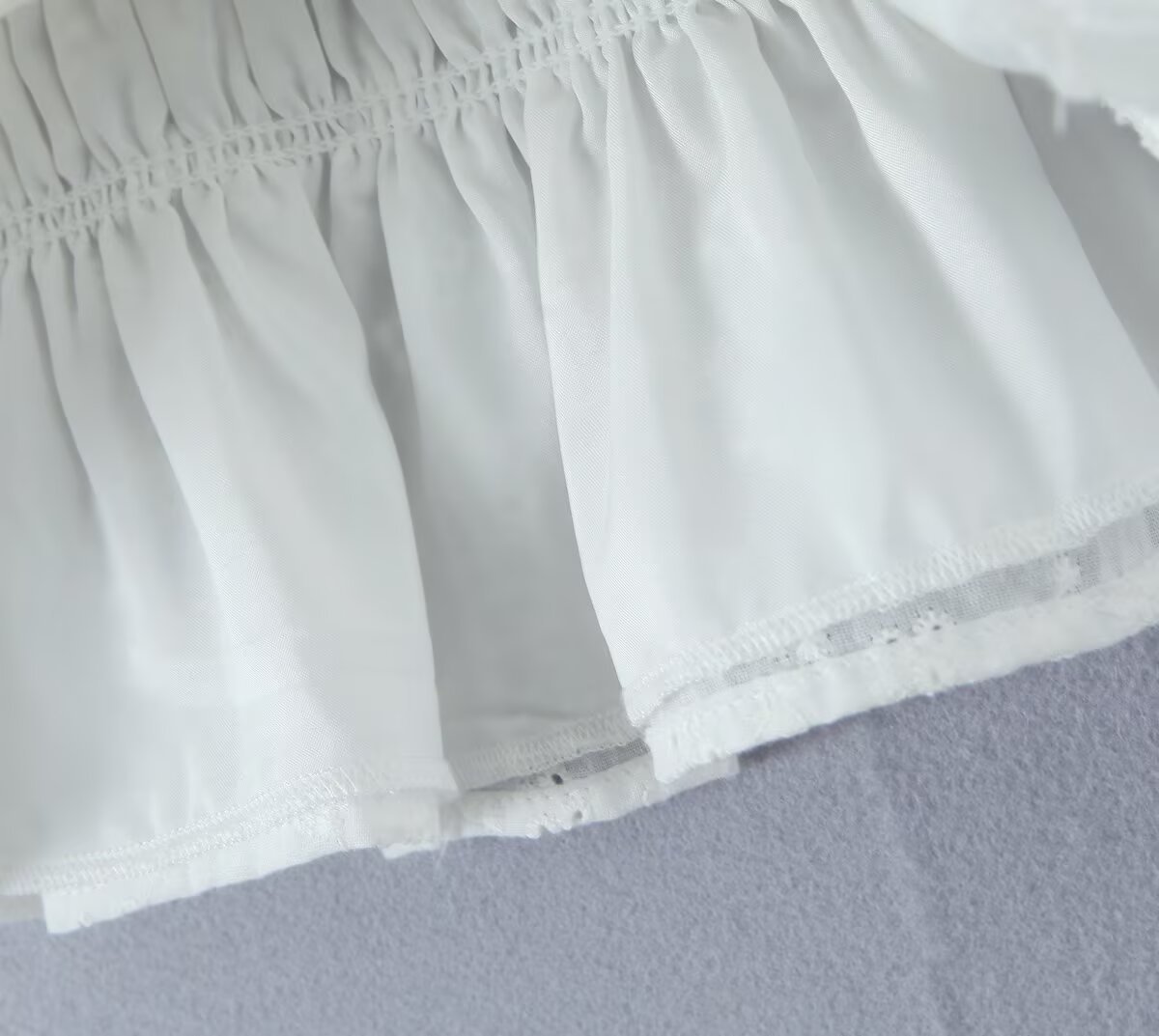 Asymmetric Mandarin Collar Ruffle Hem Top