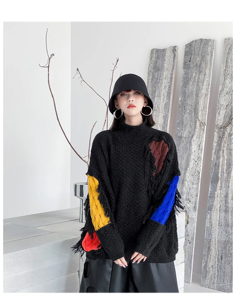 Ladies Oversized High Neck Asymmetric Paneled Fringe Sweater