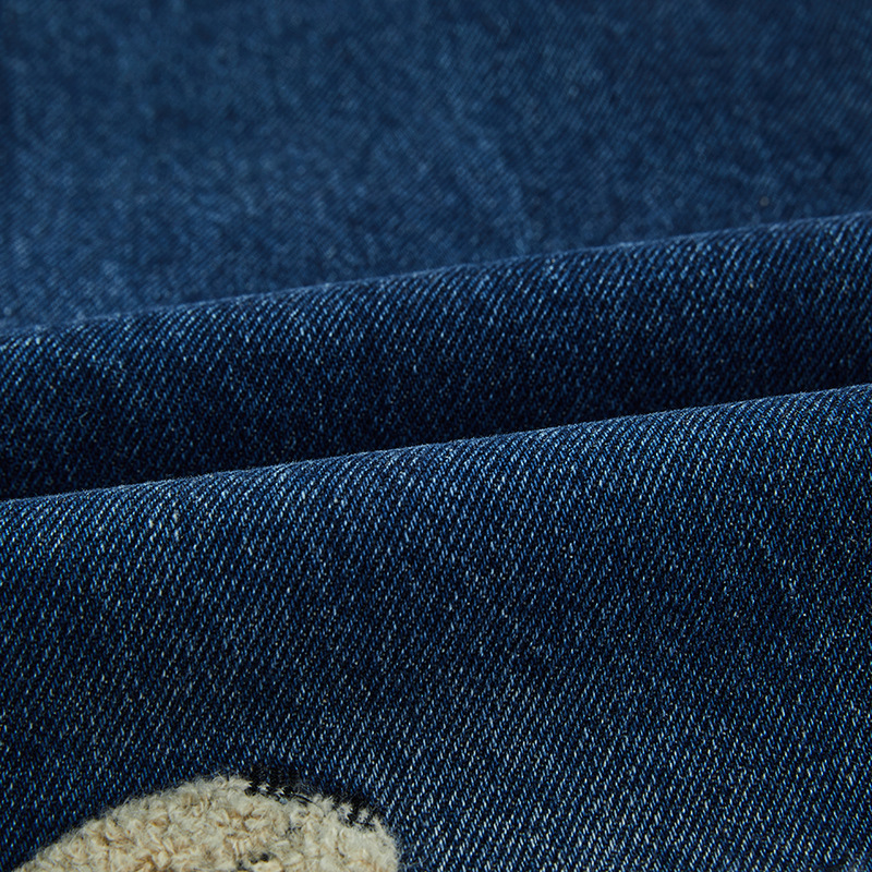Puppy patchwork embroidered washed denim jeans