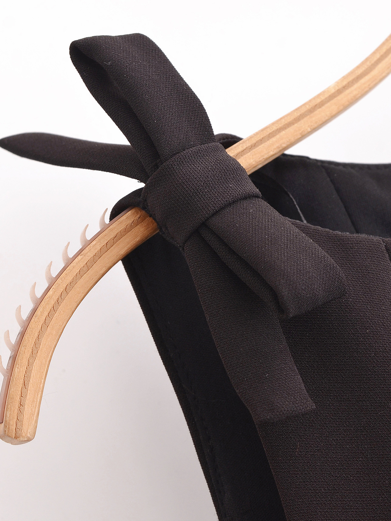 Sleeveless Solid Contemporary Flared Hem Tie Top