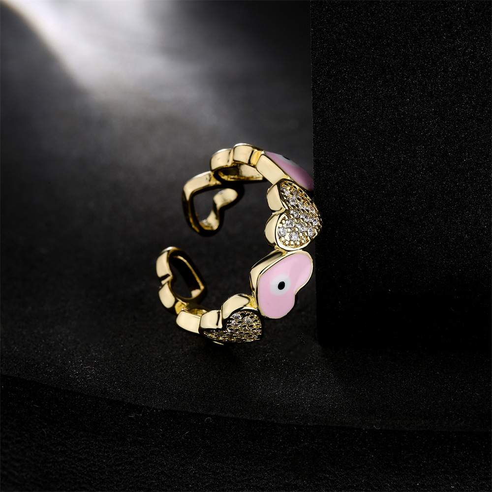 Hot selling new love oil drop zircon in Europe and America, devil's eye gold open ring for women