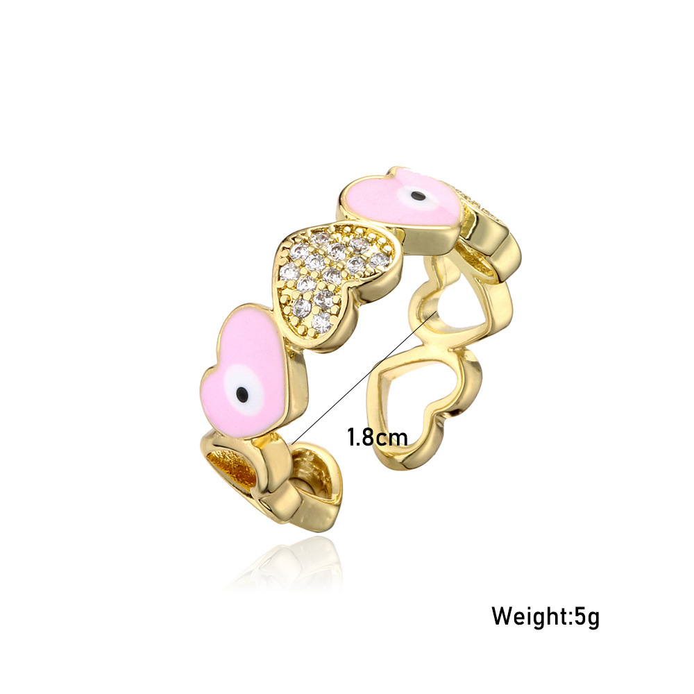 Hot selling new love oil drop zircon in Europe and America, devil's eye gold open ring for women
