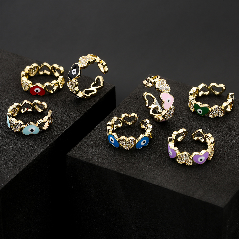 Hot selling new love oil drop zircon in Europe and America, devil's eye gold open ring for women