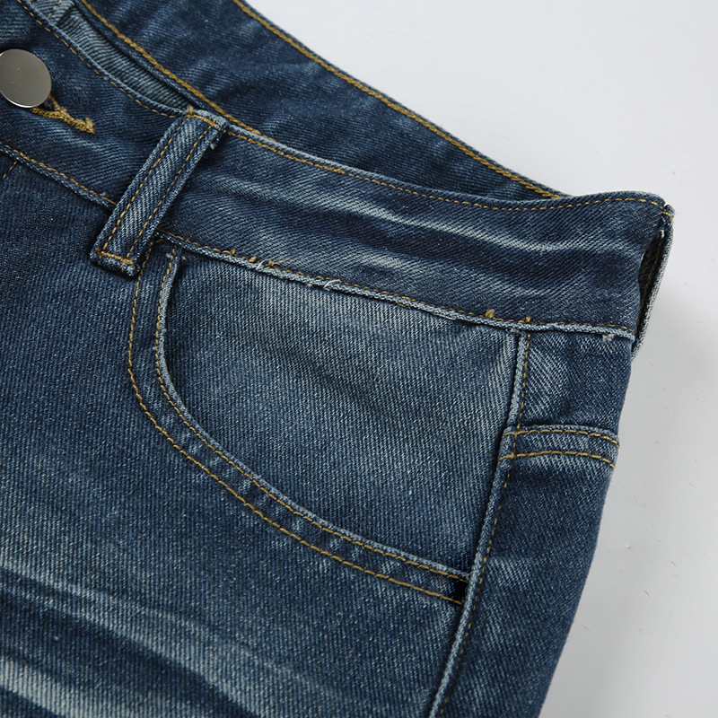 Vintage pleated washed denim jeans with loose fit and low waisted design for the street