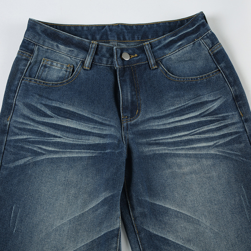 Vintage pleated washed denim jeans with loose fit and low waisted design for the street