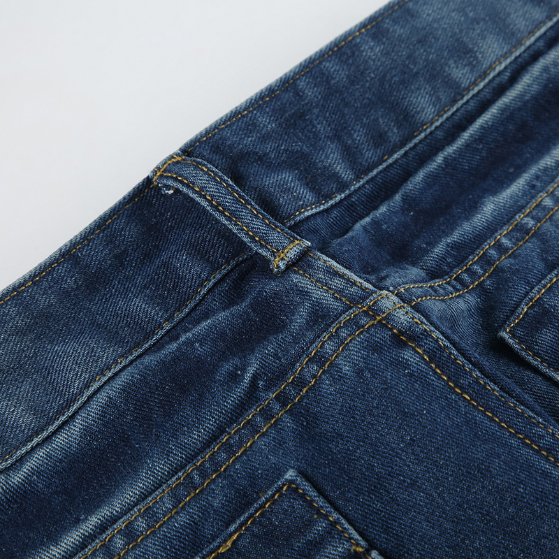 Vintage pleated washed denim jeans with loose fit and low waisted design for the street