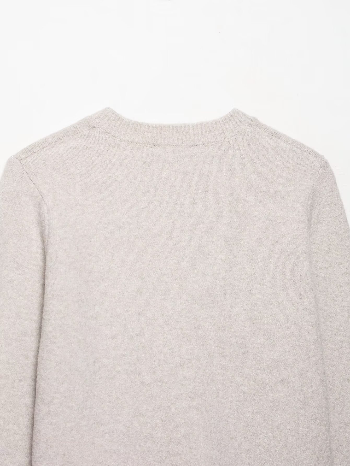 Stacked decorative knitted jacket