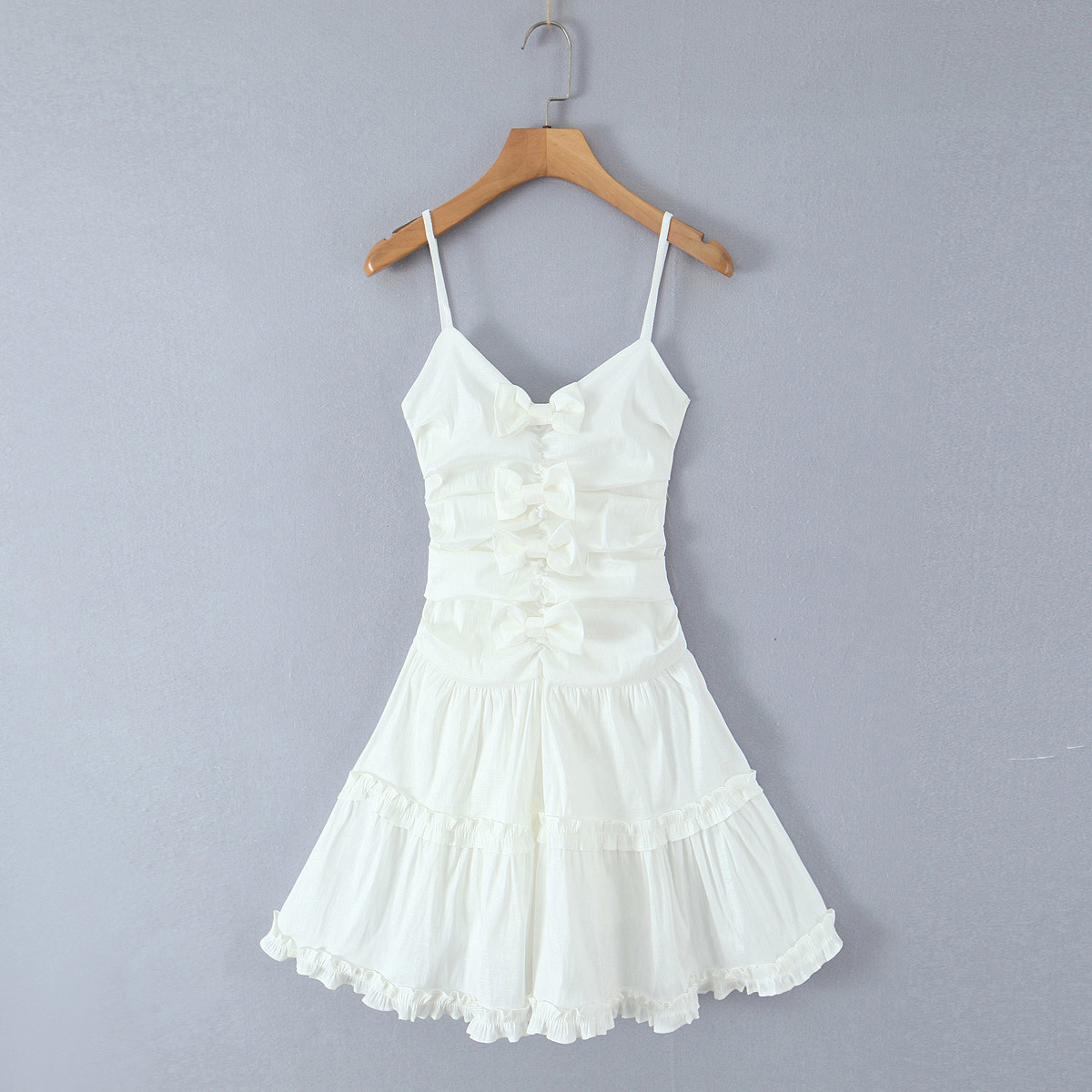 White Bow Layered Dress with Ruched Silhouette and Strapless Design
