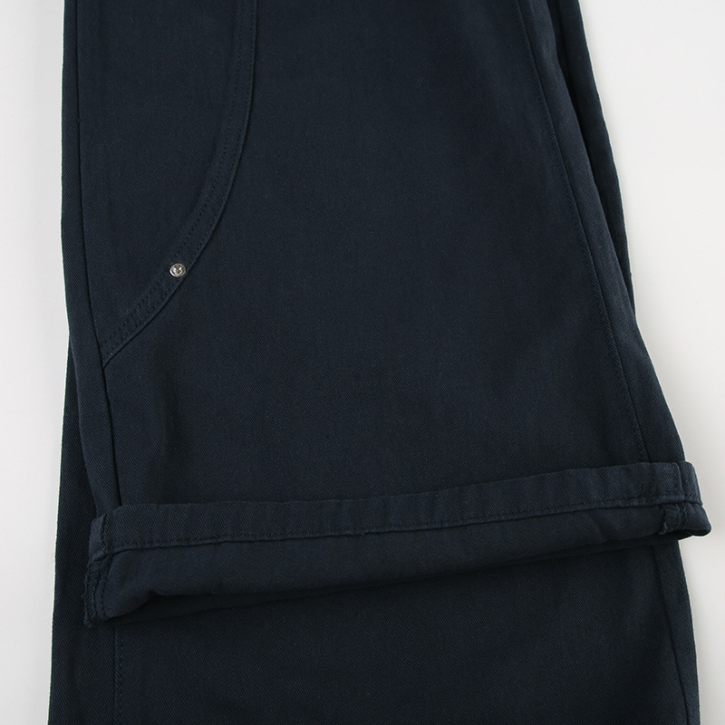 Retro rivet splicing design for split jeans