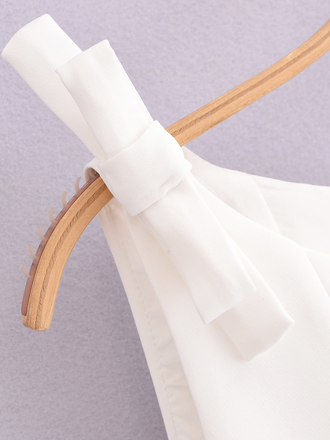 Sleeveless Solid Contemporary Flared Hem Tie Top