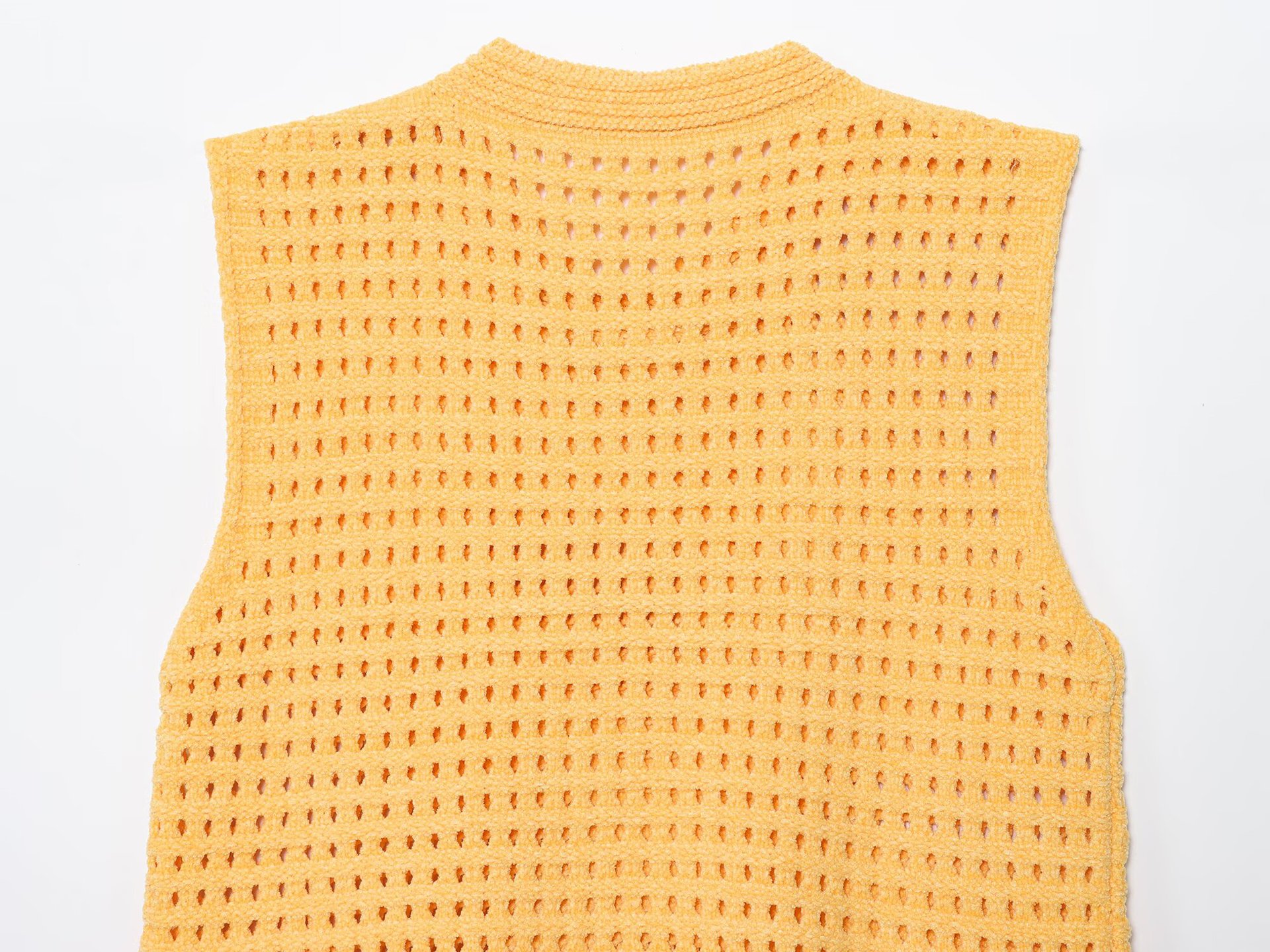 Round neck sleeveless tassel embellished hollow grid knit sweater for women