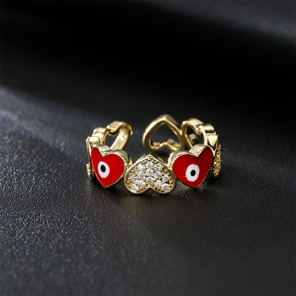 Hot selling new love oil drop zircon in Europe and America, devil's eye gold open ring for women