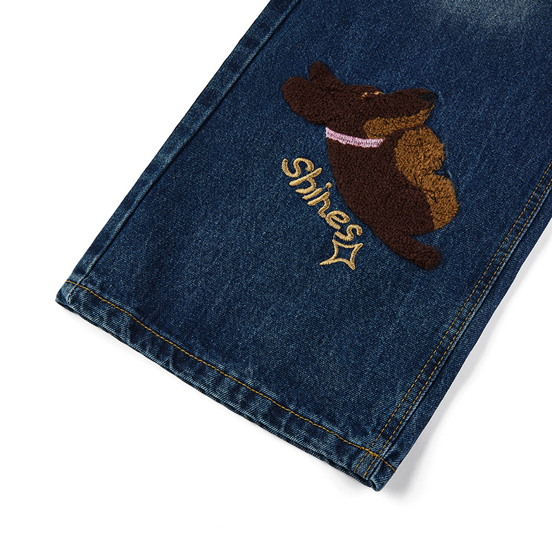Puppy patchwork embroidered washed denim jeans