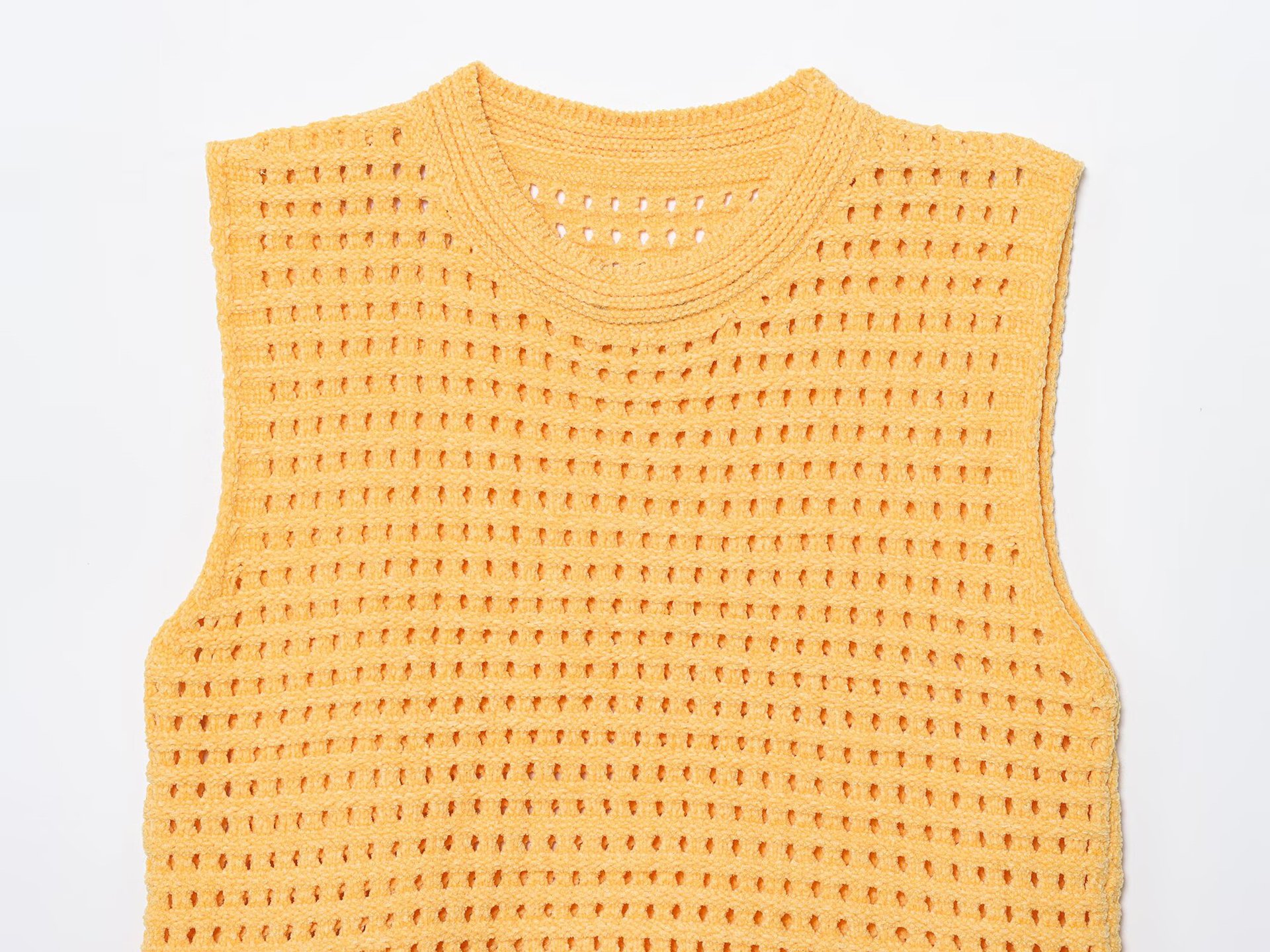 Round neck sleeveless tassel embellished hollow grid knit sweater for women