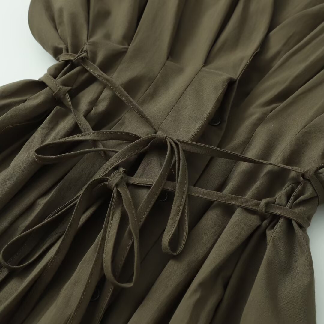 V-neck sleeveless waist cinching lace up solid color dress