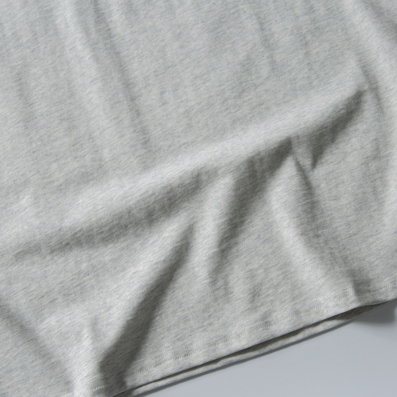 Loose shoulder length short sleeves with wrapped edge and patch pocket design
