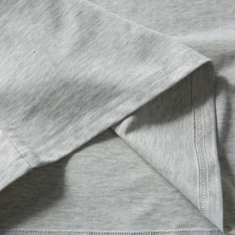 Loose shoulder length short sleeves with wrapped edge and patch pocket design