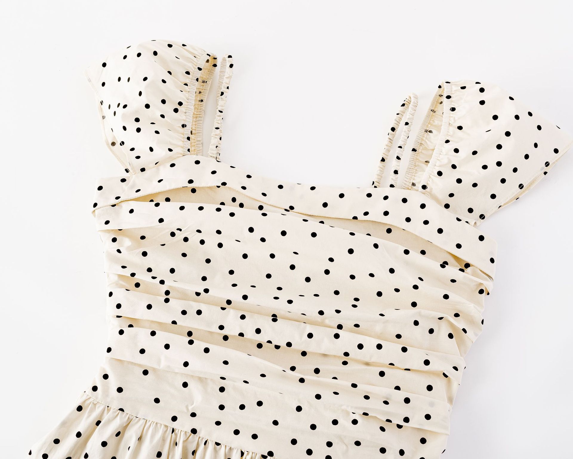 Polka dot pleated waist cinching dress
