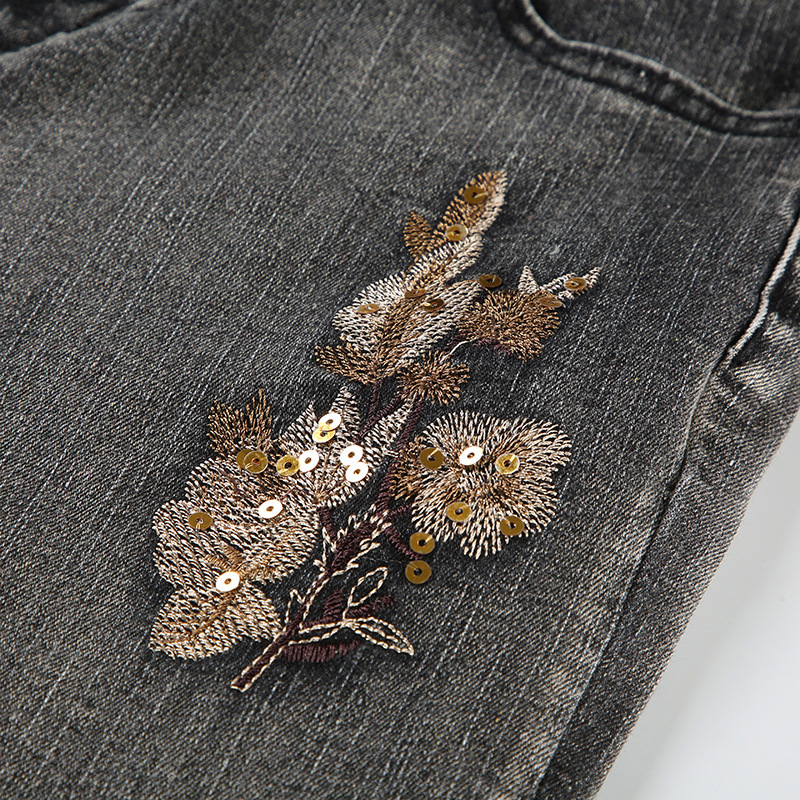 Bead embroidery floral design for vintage washed micro flared jeans